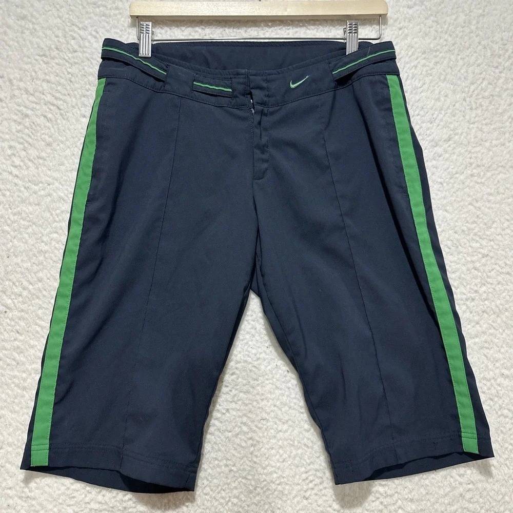 Nike Dri-Fit Sportswear‎ Shorts Size M Navy Featuring Green Stripes on the Sides